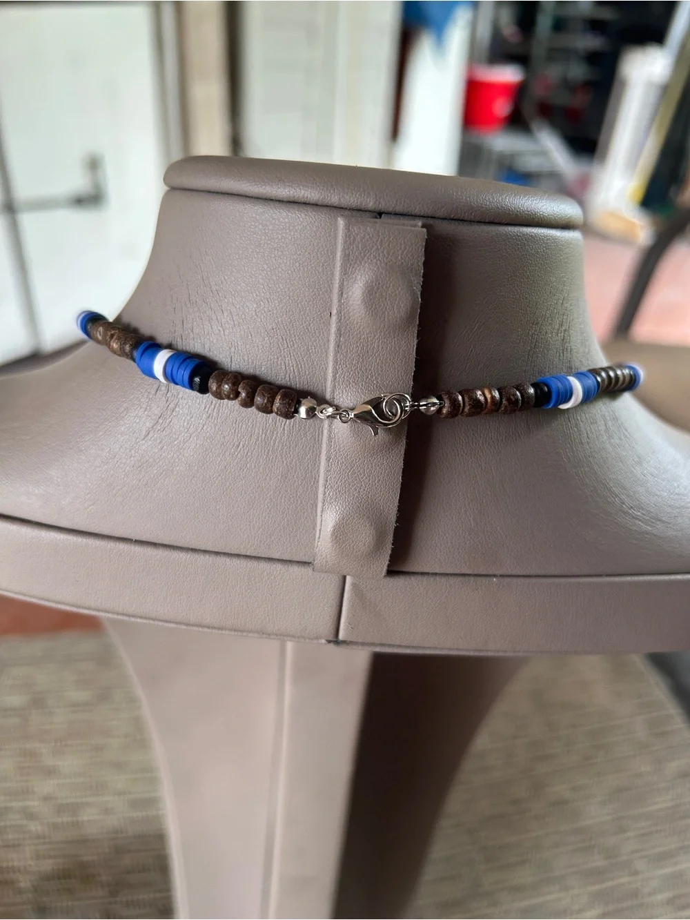 Wooden men beaded
